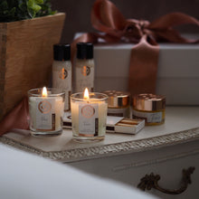 Load image into Gallery viewer, All natural, soy wax hand poured votive candles. pure essential oils. no harmful paraffin wax. suitable for vegans
